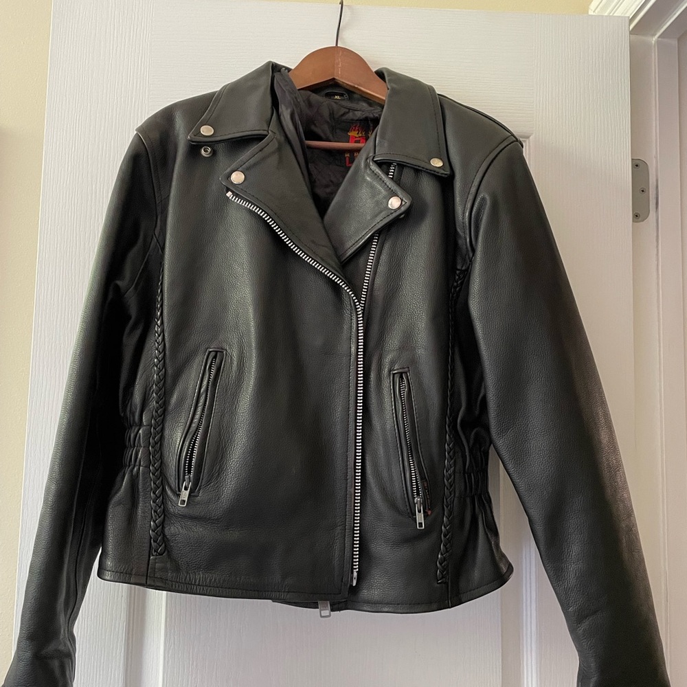 Black leather jacket and chaps for motorcycle riding sold together. $80
